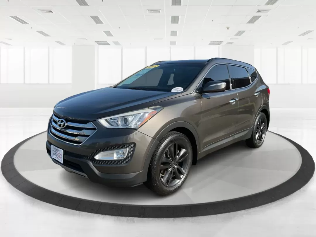 2013 Hyundai Santa Fe Sport 2.0 AWD (5XYZUDLA2DG) with an 2.0L L4 DOHC 16V engine, 6-Speed Automatic transmission, located at 1099 N County Rd 25A , Troy, OH, 45373, (937) 908-9800, 40.057079, -84.212883 - Photo#7