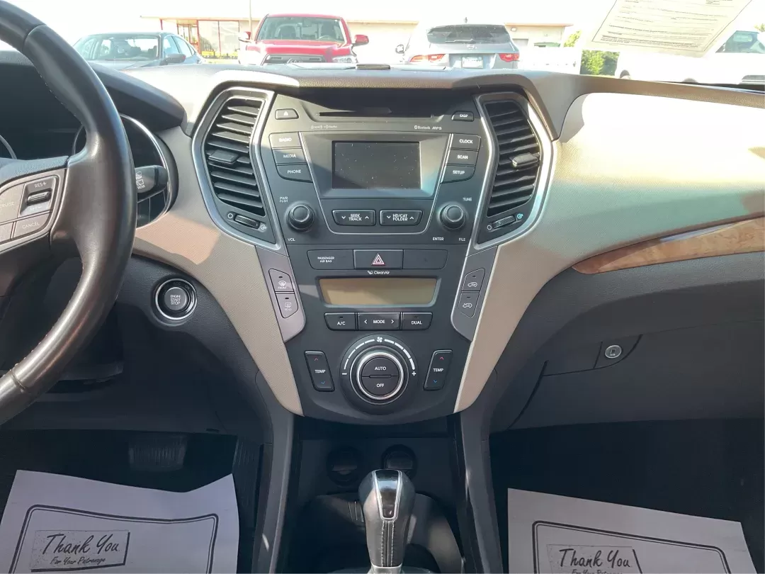2013 Hyundai Santa Fe Sport 2.0 AWD (5XYZUDLA2DG) with an 2.0L L4 DOHC 16V engine, 6-Speed Automatic transmission, located at 1099 N County Rd 25A , Troy, OH, 45373, (937) 908-9800, 40.057079, -84.212883 - Photo#12
