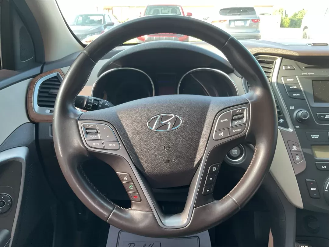 2013 Hyundai Santa Fe Sport 2.0 AWD (5XYZUDLA2DG) with an 2.0L L4 DOHC 16V engine, 6-Speed Automatic transmission, located at 1099 N County Rd 25A , Troy, OH, 45373, (937) 908-9800, 40.057079, -84.212883 - Photo#15