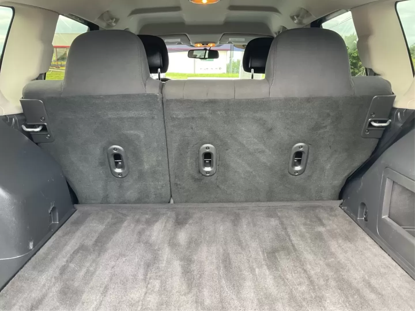2015 Jeep Compass Sport (1C4NJDBB6FD) with an 2.4L I-4 DOHC engine, located at 880 E. National Road, Vandalia, OH, 45377, (937) 908-9800, 39.891918, -84.183594 - **Explore Adventure and Comfort with the 2015 Jeep Compass Sport at Advantage Car and Credit!**<br /> <br /> Whether you're navigating your daily commute or embarking on a weekend getaway, the 2015 Jeep Compass Sport is designed with versatility in mind. With a spacious interior and rugged capabilit - Photo#12