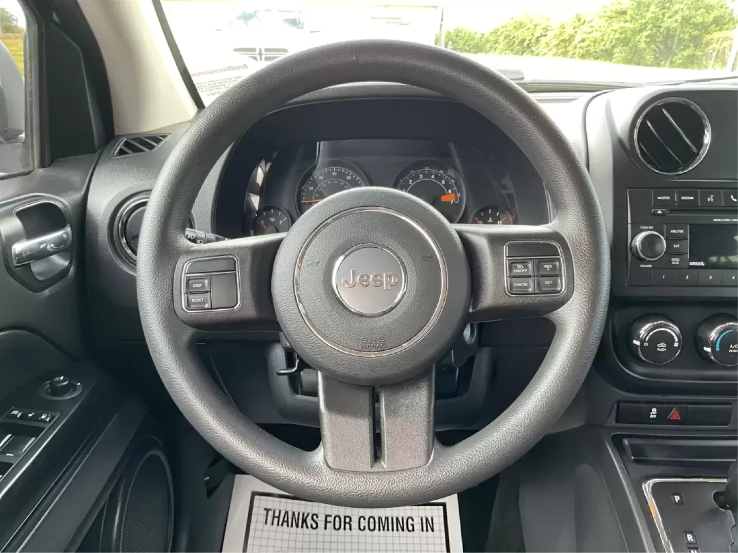 2015 Jeep Compass Sport (1C4NJDBB6FD) with an 2.4L I-4 DOHC engine, located at 880 E. National Road, Vandalia, OH, 45377, (937) 908-9800, 39.891918, -84.183594 - **Explore Adventure and Comfort with the 2015 Jeep Compass Sport at Advantage Car and Credit!**<br /> <br /> Whether you're navigating your daily commute or embarking on a weekend getaway, the 2015 Jeep Compass Sport is designed with versatility in mind. With a spacious interior and rugged capabilit - Photo#16