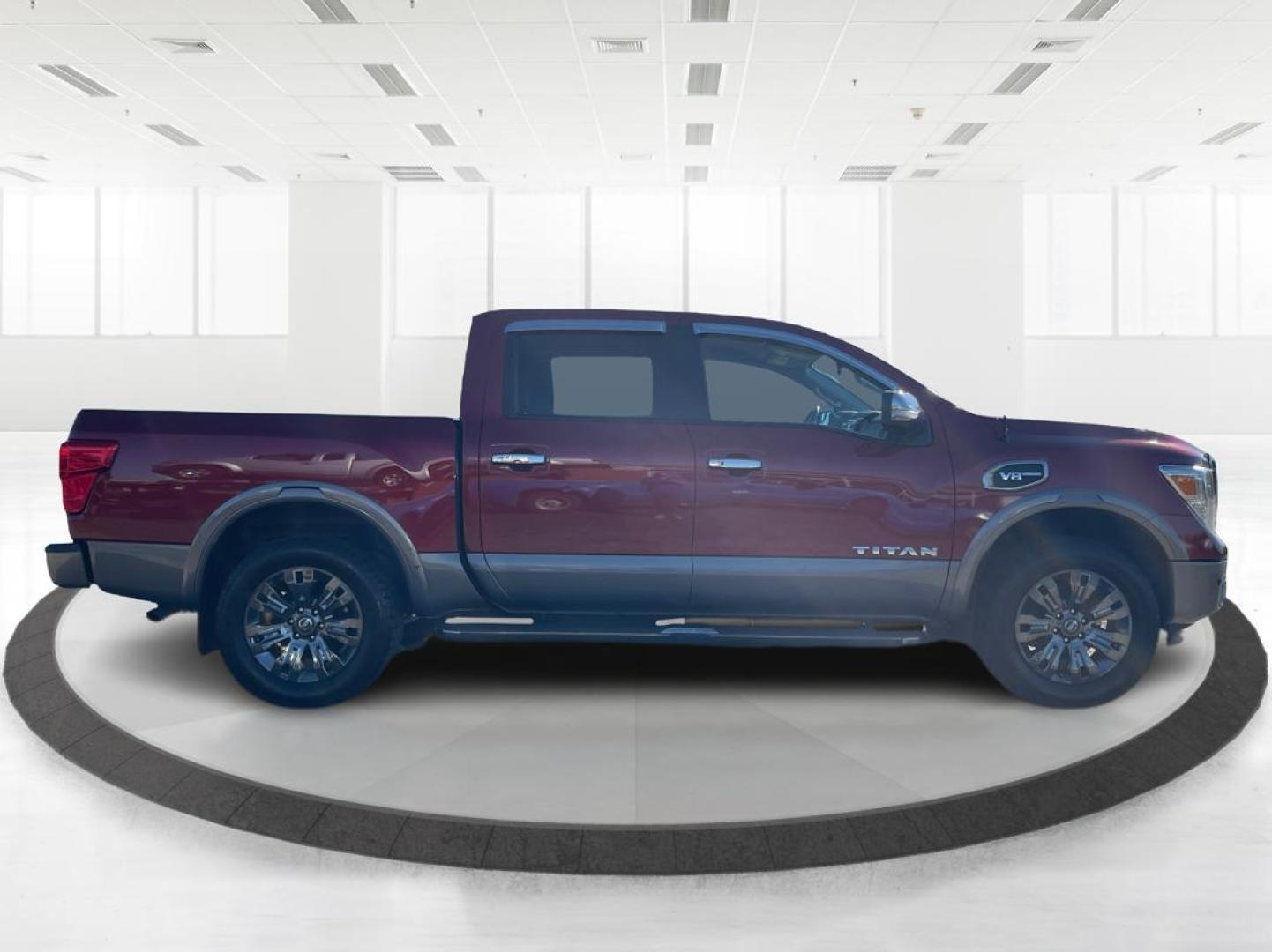 2017 Nissan Titan Platinum Reserve Crew Cab 4WD (1N6AA1E53HN) with an 5.6L V8 DOHC 32V engine, 6-Speed Automatic transmission, located at 1230 East Main St, Xenia, OH, 45385, (937) 908-9800, 39.688026, -83.910172 - Photo#1