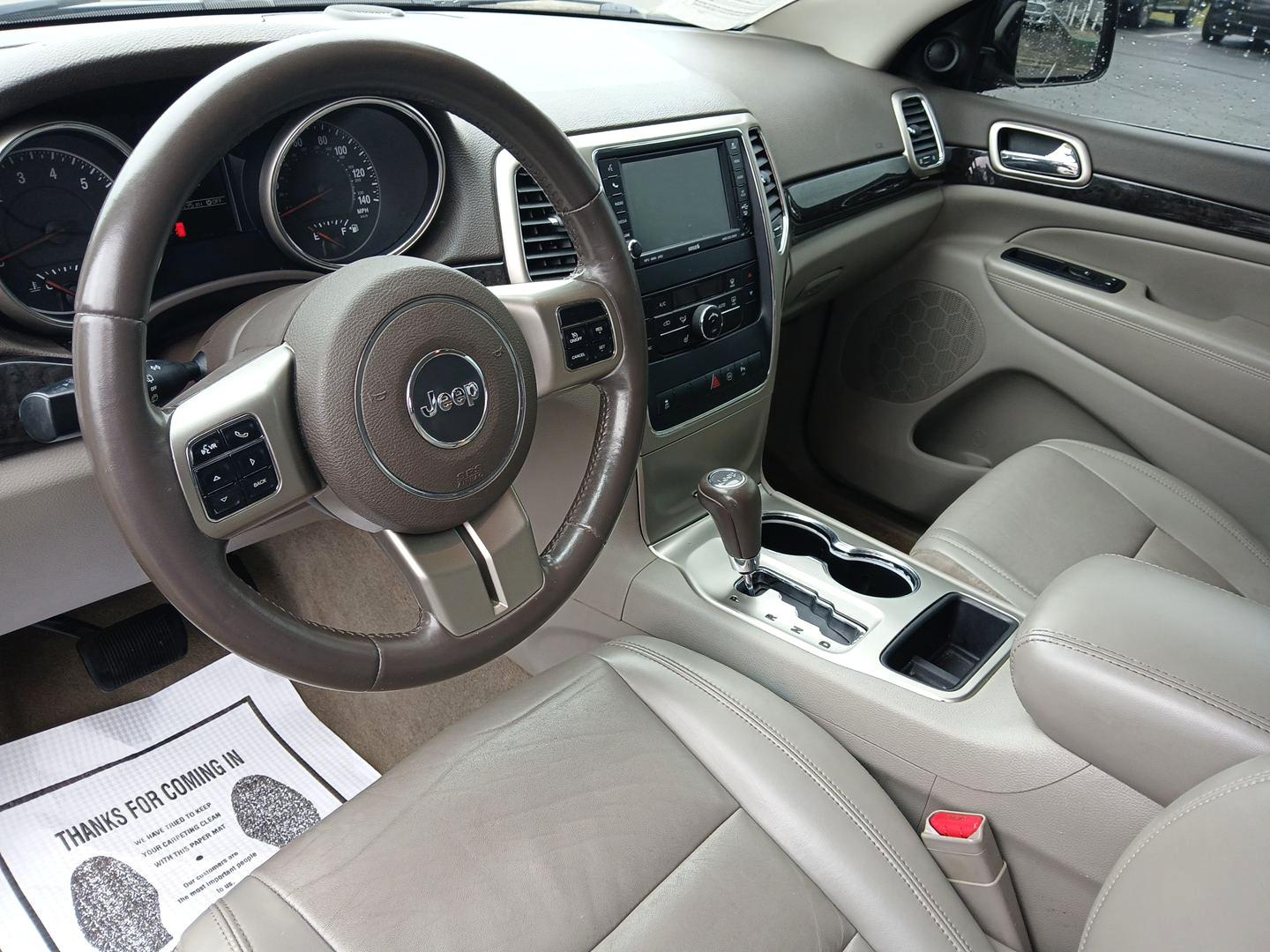 2011 Jeep Grand Cherokee Laredo 4WD (1J4RR4GG9BC) with an 3.6L V6 DOHC 24V engine, 5-Speed Automatic transmission, located at 1230 East Main St, Xenia, OH, 45385, (937) 908-9800, 39.688026, -83.910172 - 2011 Jeep Grand Cherokee Laredo 4WD - Photo#8