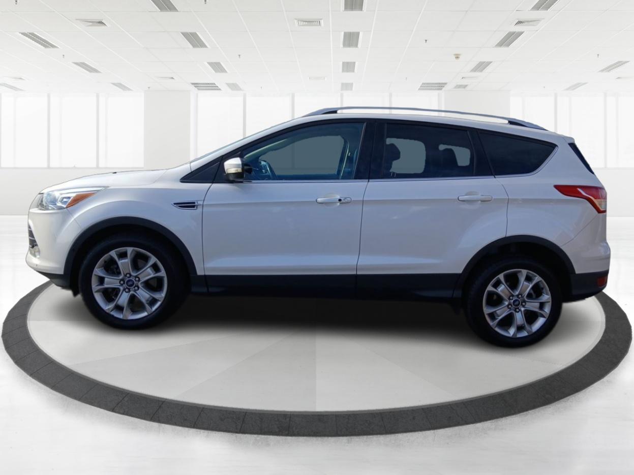 2015 Ford Escape Titanium 4WD (1FMCU9J93FU) with an 2.0L L4 DOHC 16V engine, 6-Speed Automatic transmission, located at 1184 Kauffman Ave, Fairborn, OH, 45324, (937) 908-9800, 39.807072, -84.030914 - Photo#5