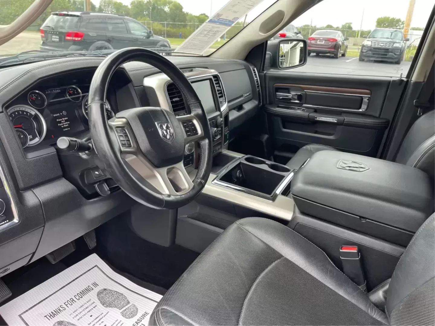 2015 Ram 1500 Laramie Crew Cab SWB 4WD (1C6RR7NT7FS) with an 5.7L V8 OHV 16V engine, 8-Speed Automatic transmission, located at 1230 East Main St, Xenia, OH, 45385, (937) 908-9800, 39.688026, -83.910172 - Photo#9