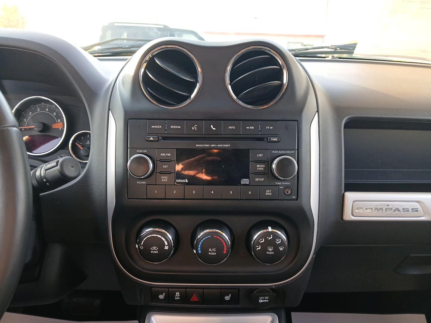 2016 Jeep Compass Latitude FWD (1C4NJCEB4GD) with an 2.4L L4 DOHC 16V engine, Continuously Variable Transmission transmission, located at 880 E. National Road, Vandalia, OH, 45377, (937) 908-9800, 39.891918, -84.183594 - 2016 Jeep Compass Latitude FWD - Photo#12