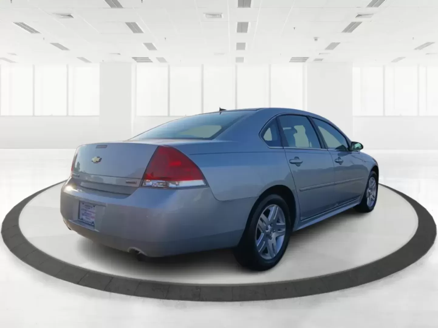 2014 Chevrolet Impala Limited LT (2G1WB5E3XE1) with an 3.6L V6 DOHC 16V FFV engine, 6-Speed Automatic transmission, located at 8750 N County Rd 25A, Piqua, OH, 45356, (937) 908-9800, 40.164391, -84.232513 - Photo#2