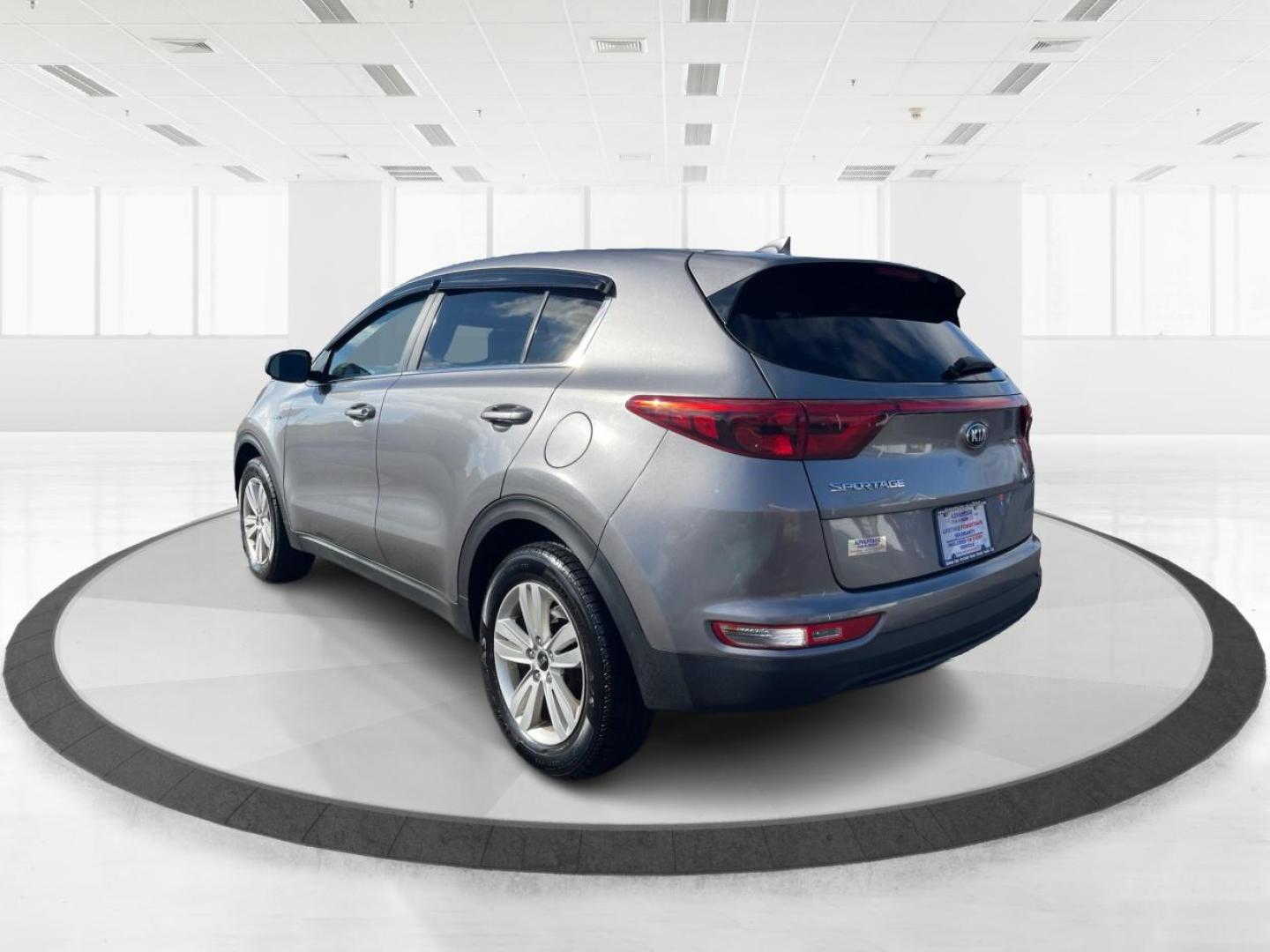 2017 Kia Sportage LX AWD (KNDPMCAC1H7) with an 2.4L V6 DOHC 24V engine, 6-Speed Automatic transmission, located at 8750 N County Rd 25A, Piqua, OH, 45356, (937) 908-9800, 40.164391, -84.232513 - Photo#4