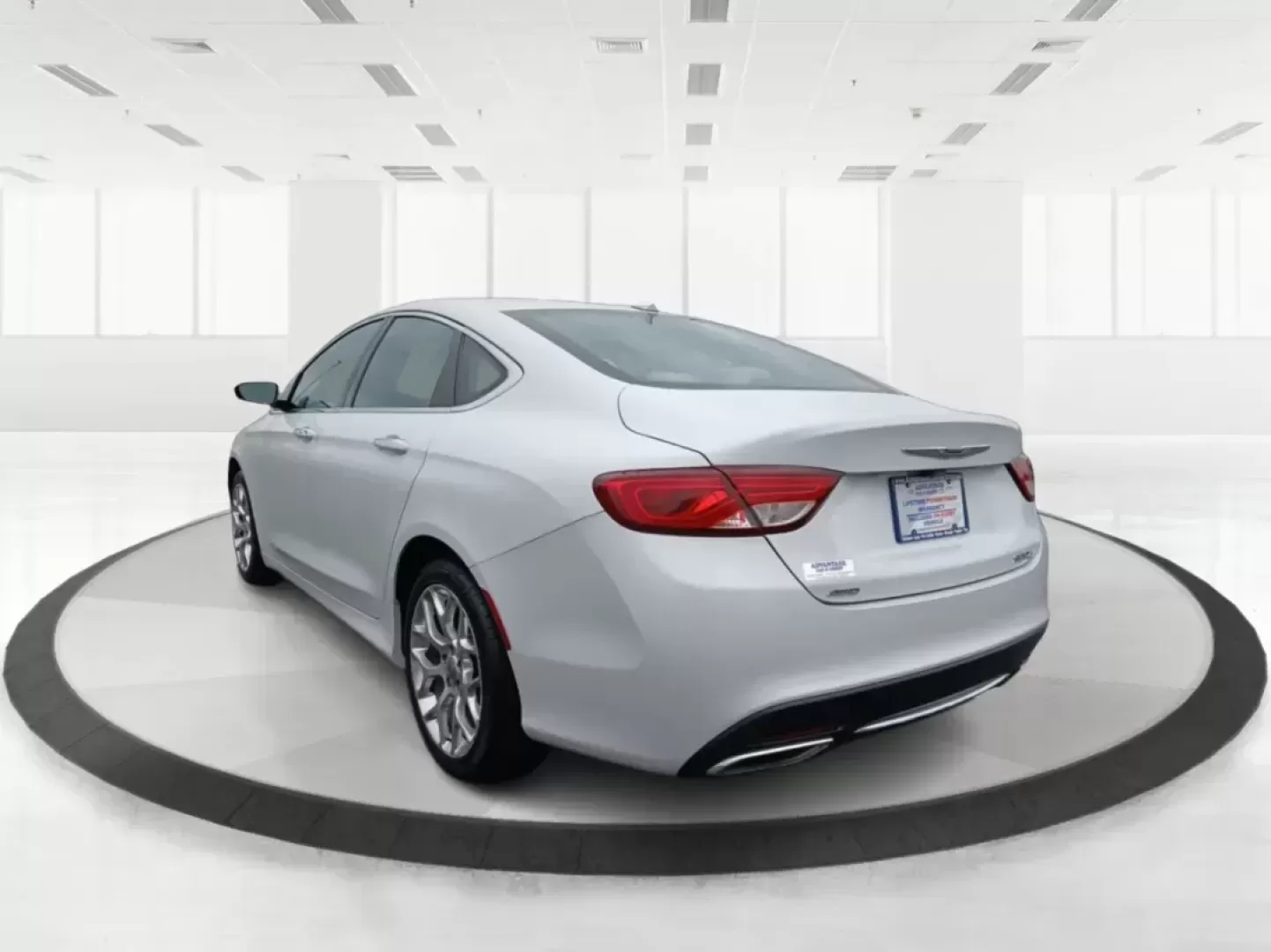 2015 Chrysler 200 C AWD (1C3CCCEG3FN) with an 3.6L V6 DOHC 24V FFV engine, 9-Speed Automatic transmission, located at 4508 South Dixie Dr, Moraine, OH, 45439, (937) 908-9800, 39.689976, -84.218452 - 2015 Chrysler 200 C AWD - Photo#4