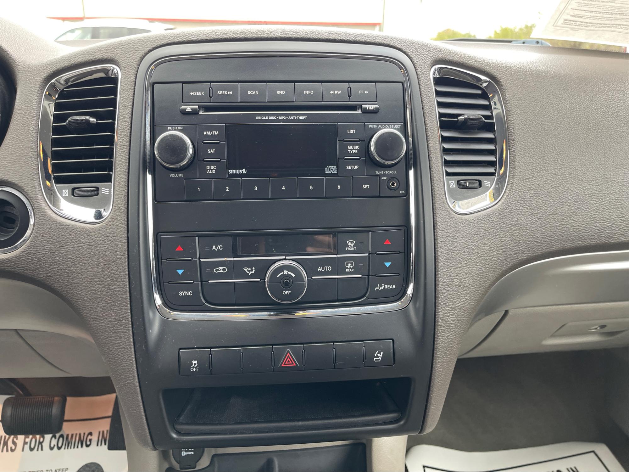 2012 Dodge Durango SXT AWD (1C4RDJAGXCC) with an 3.6L V6 DOHC 24V engine, 5-Speed Automatic transmission, located at 1184 Kauffman Ave, Fairborn, OH, 45324, (937) 908-9800, 39.807072, -84.030914 - Third Row - Photo#12