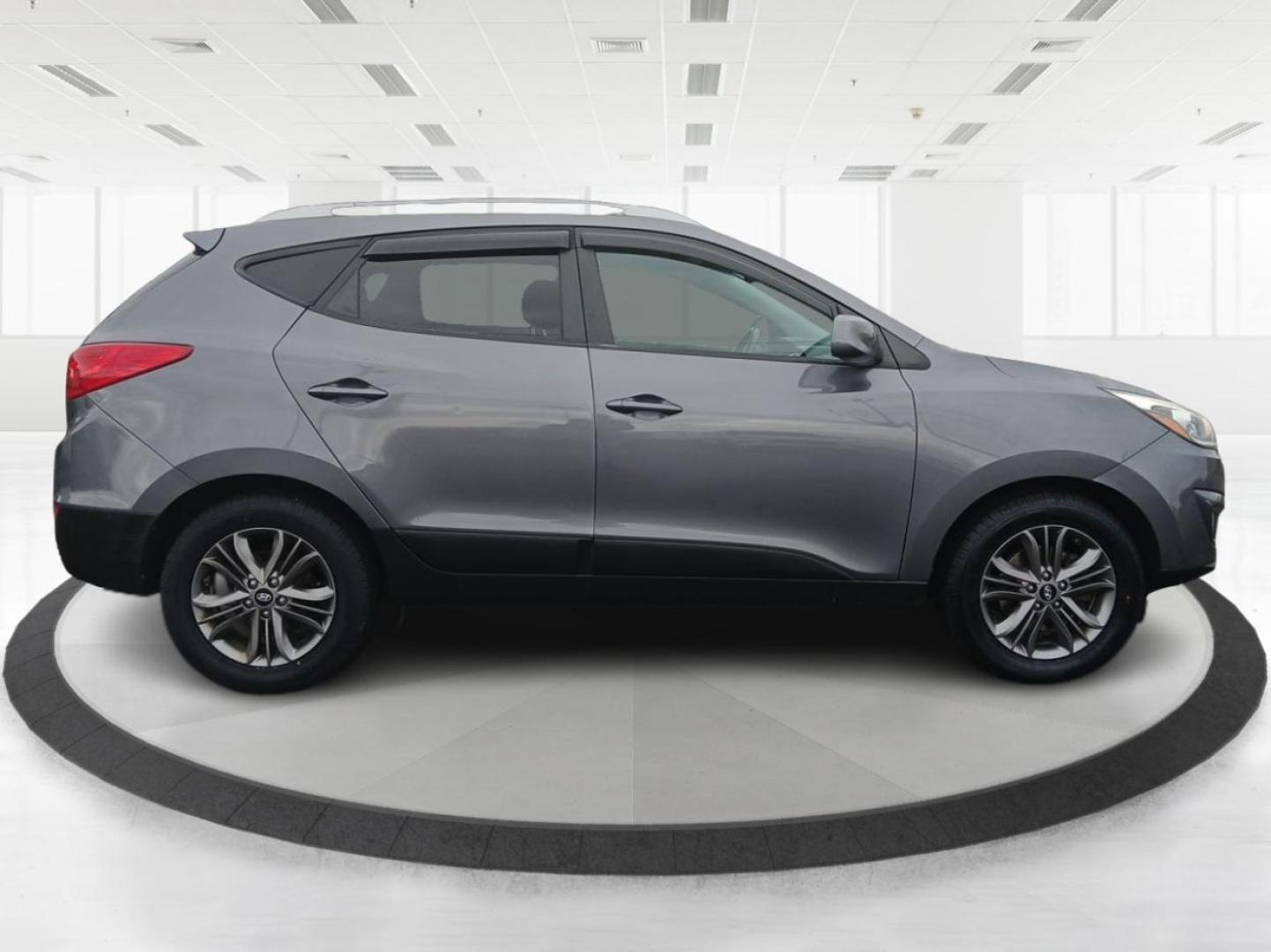 2014 Hyundai Tucson GLS AWD (KM8JUCAGXEU) with an 2.4L L4 DOHC 16V engine, 6-Speed Automatic transmission, located at 880 E. National Road, Vandalia, OH, 45377, (937) 908-9800, 39.891918, -84.183594 - 2014 Hyundai Tucson GLS AWD - Photo#1