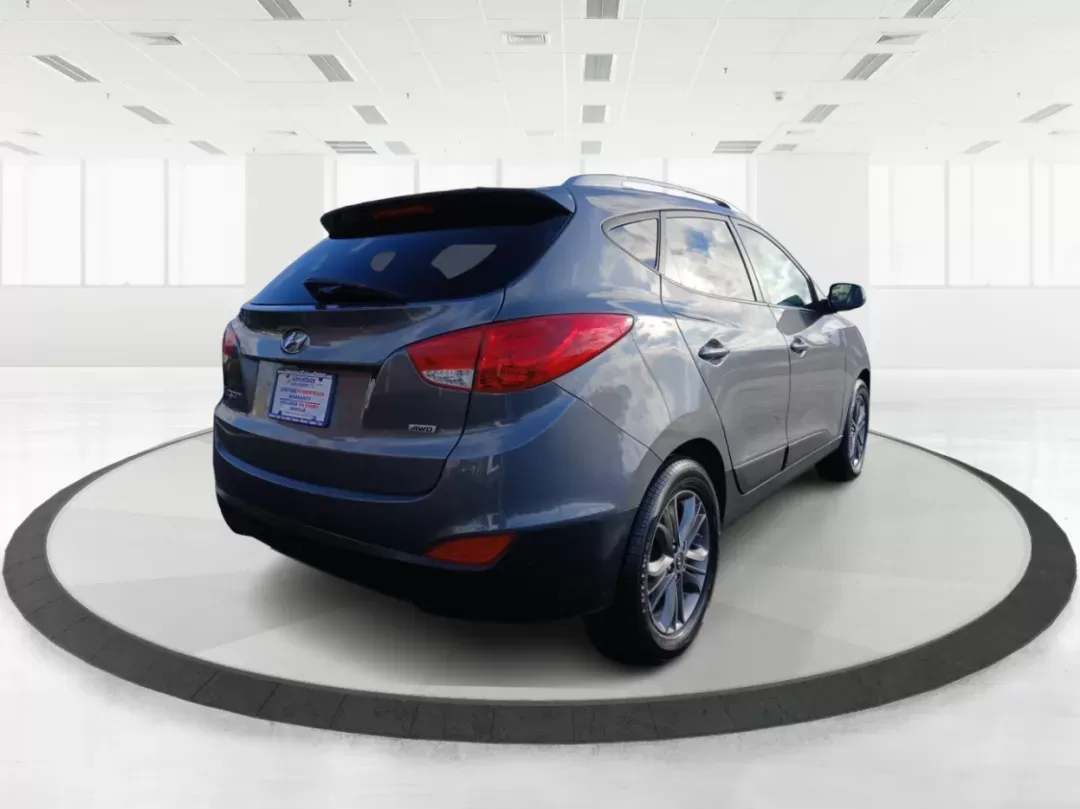 2014 Hyundai Tucson GLS AWD (KM8JUCAG3EU) with an 2.4L L4 DOHC 16V engine, 6-Speed Automatic transmission, located at 1951 S Dayton Lakeview Rd., New Carlisle, OH, 45344, (937) 908-9800, 39.890999, -84.050255 - 2014 Hyundai Tucson GLS AWD - Photo#2