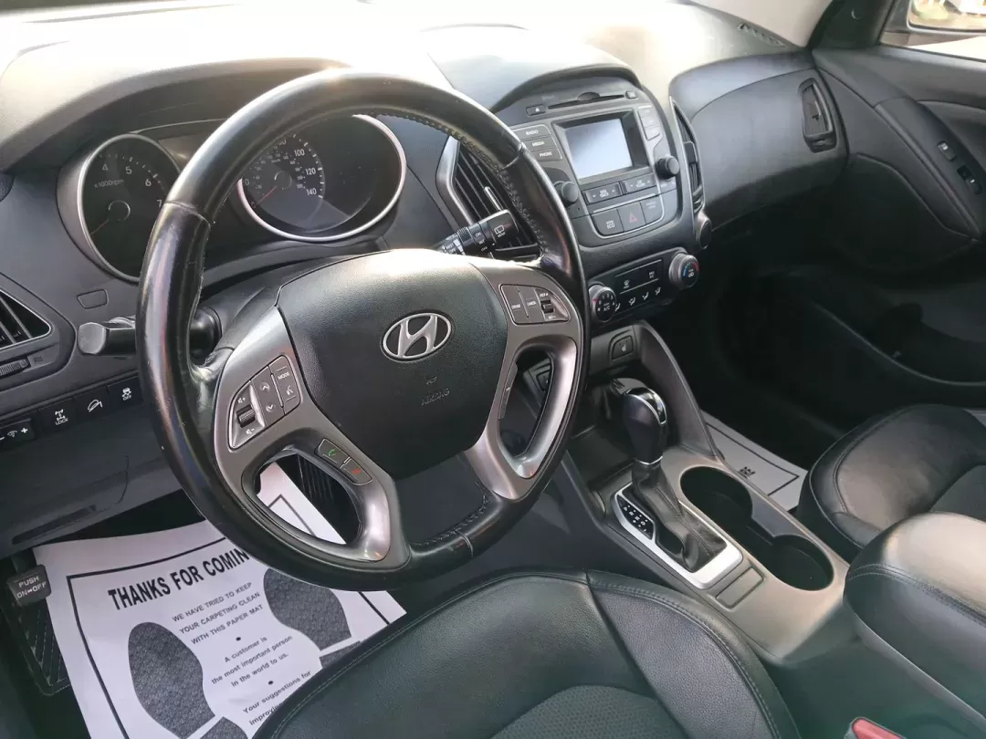 2014 Hyundai Tucson GLS AWD (KM8JUCAG3EU) with an 2.4L L4 DOHC 16V engine, 6-Speed Automatic transmission, located at 1951 S Dayton Lakeview Rd., New Carlisle, OH, 45344, (937) 908-9800, 39.890999, -84.050255 - 2014 Hyundai Tucson GLS AWD - Photo#8