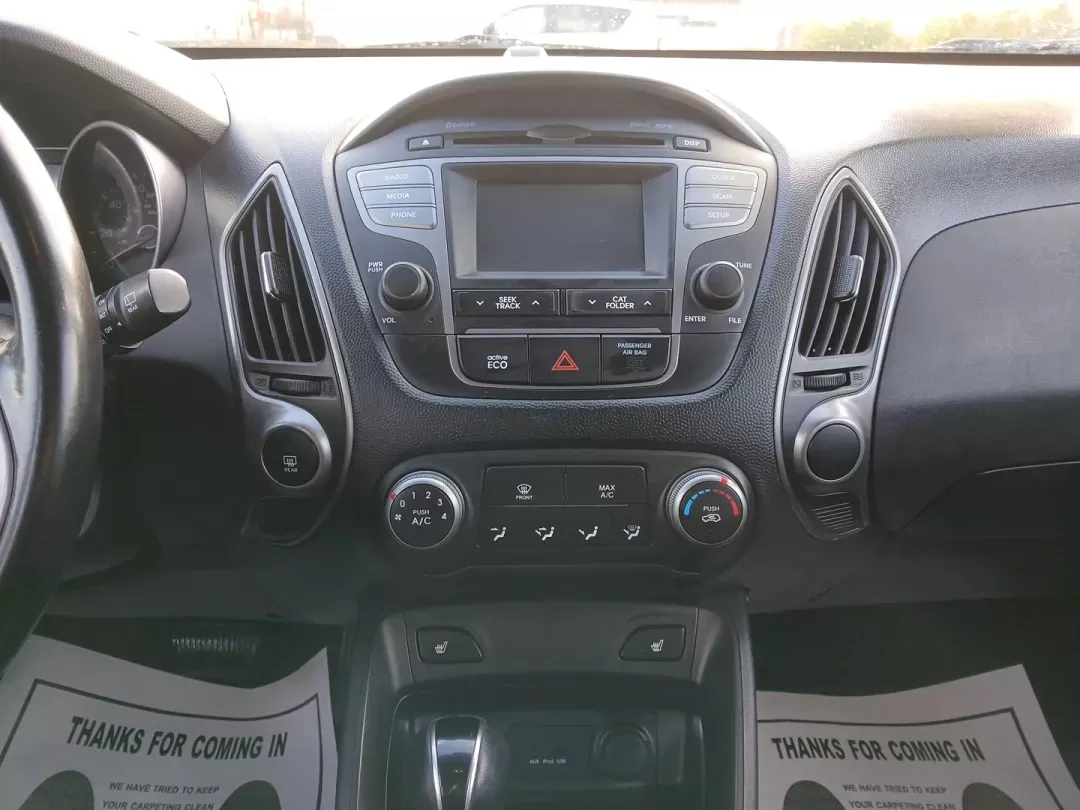 2014 Hyundai Tucson GLS AWD (KM8JUCAG3EU) with an 2.4L L4 DOHC 16V engine, 6-Speed Automatic transmission, located at 1951 S Dayton Lakeview Rd., New Carlisle, OH, 45344, (937) 908-9800, 39.890999, -84.050255 - 2014 Hyundai Tucson GLS AWD - Photo#12