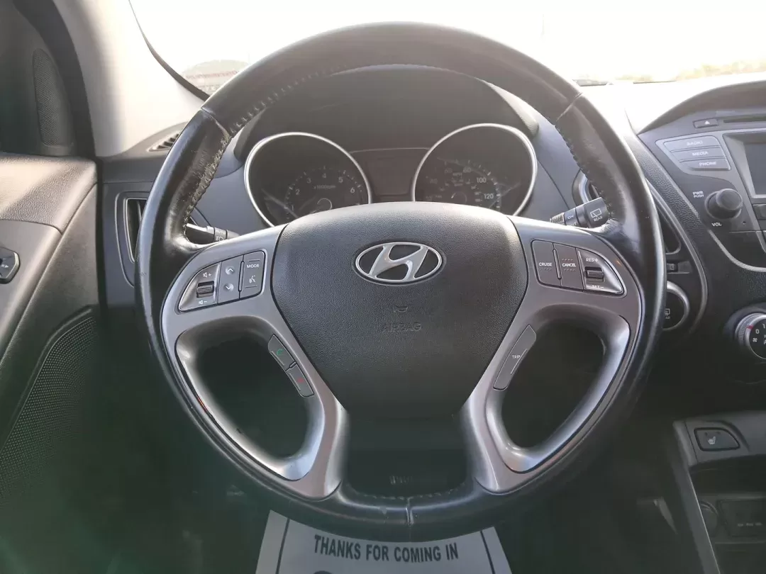 2014 Hyundai Tucson GLS AWD (KM8JUCAG3EU) with an 2.4L L4 DOHC 16V engine, 6-Speed Automatic transmission, located at 1951 S Dayton Lakeview Rd., New Carlisle, OH, 45344, (937) 908-9800, 39.890999, -84.050255 - 2014 Hyundai Tucson GLS AWD - Photo#15