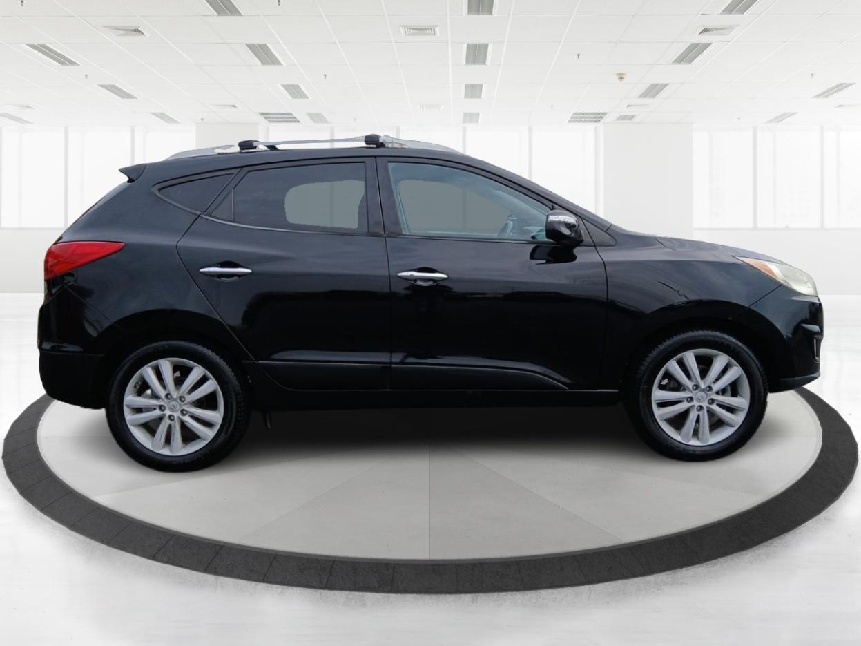 2013 Hyundai Tucson Limited 2WD (KM8JU3AC1DU) with an 2.4L L4 DOHC 16V engine, 6-Speed Automatic transmission, located at 401 Woodman Dr, Riverside, OH, 45431, (937) 908-9800, 39.760899, -84.123421 - Photo#1