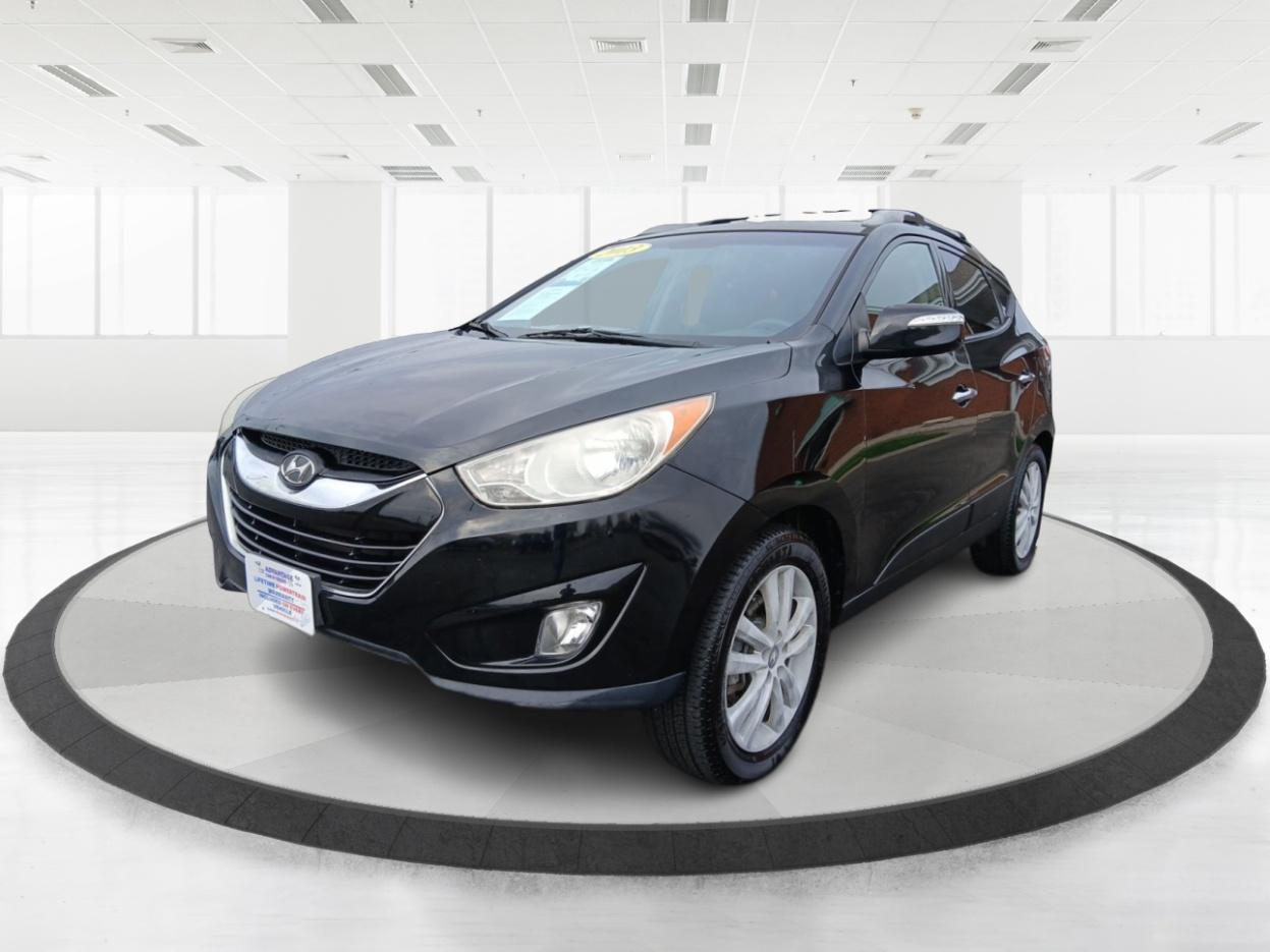 2013 Hyundai Tucson Limited 2WD (KM8JU3AC1DU) with an 2.4L L4 DOHC 16V engine, 6-Speed Automatic transmission, located at 401 Woodman Dr, Riverside, OH, 45431, (937) 908-9800, 39.760899, -84.123421 - Photo#7