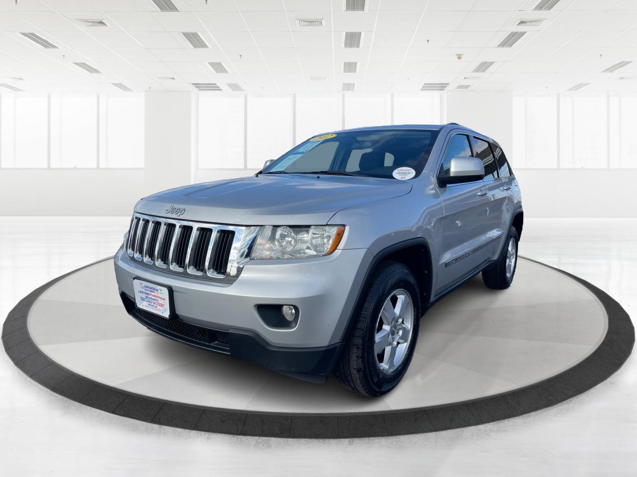 2012 Jeep Grand Cherokee Laredo 4WD (1C4RJFAG2CC) with an 3.6L V6 DOHC 24V engine, 5-Speed Automatic transmission, located at 1099 N County Rd 25A , Troy, OH, 45373, (937) 908-9800, 40.057079, -84.212883 - 2012 Jeep Grand Cherokee Laredo 4WD - Photo#7