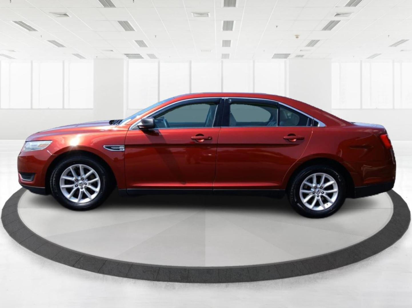 2014 Ford Taurus SE FWD (1FAHP2D88EG) with an 3.5L V6 DOHC 24V engine, 6-Speed Automatic transmission, located at 880 E. National Road, Vandalia, OH, 45377, (937) 908-9800, 39.891918, -84.183594 - Photo#5