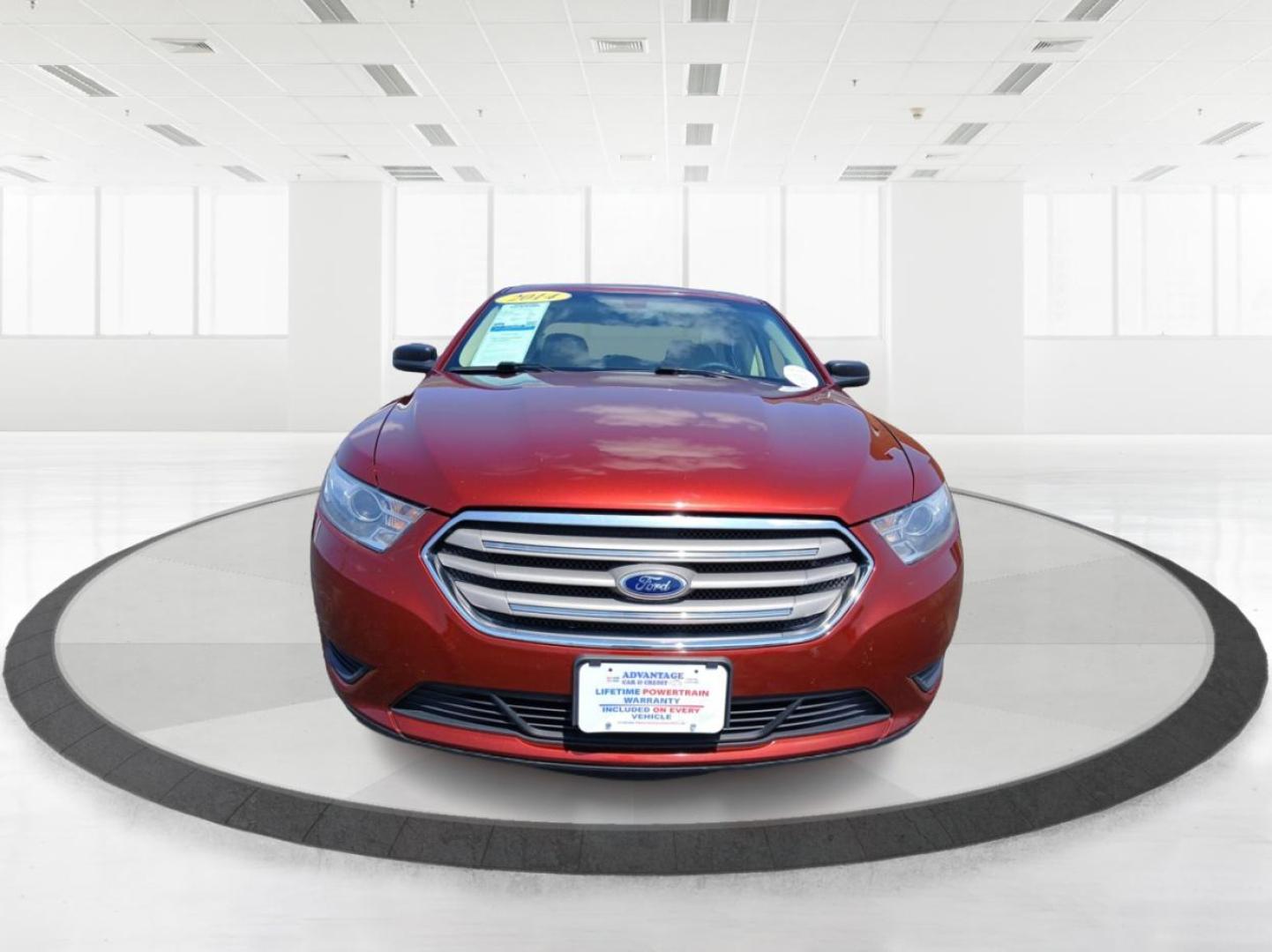 2014 Ford Taurus SE FWD (1FAHP2D88EG) with an 3.5L V6 DOHC 24V engine, 6-Speed Automatic transmission, located at 880 E. National Road, Vandalia, OH, 45377, (937) 908-9800, 39.891918, -84.183594 - Photo#6