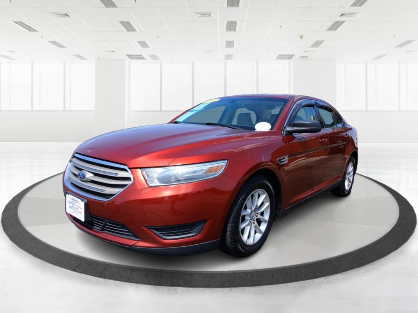 2014 Ford Taurus SE FWD (1FAHP2D88EG) with an 3.5L V6 DOHC 24V engine, 6-Speed Automatic transmission, located at 880 E. National Road, Vandalia, OH, 45377, (937) 908-9800, 39.891918, -84.183594 - Photo#7