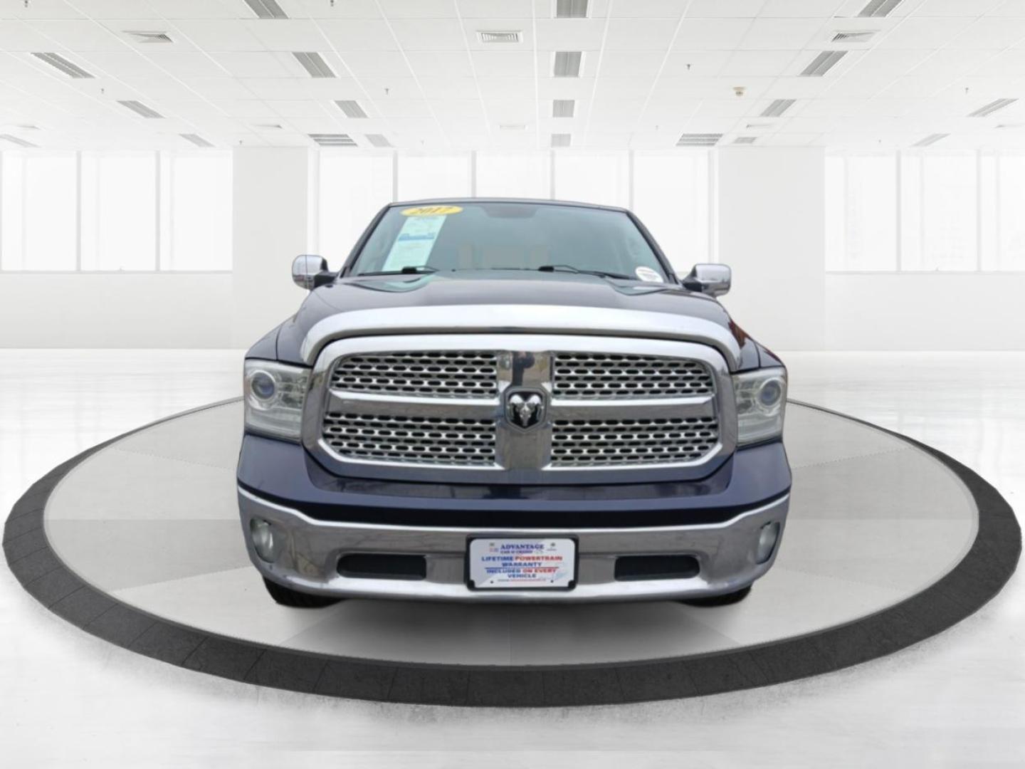 2017 Ram 1500 Laramie Quad Cab 4WD (1C6RR7JT1HS) with an 5.7L V8 OHV 16V engine, 8-Speed Automatic transmission, located at 1099 N County Rd 25A, Troy, OH, 45373, (937) 908-9800, 40.057079, -84.212883 - 2017 Ram 1500 Laramie Quad Cab 4WD - Photo#6