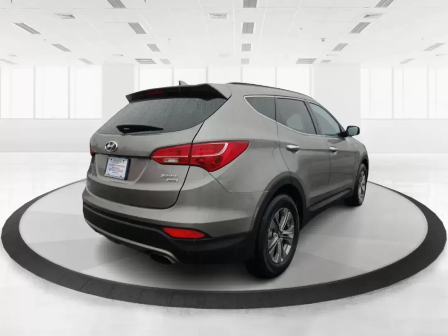 2016 Hyundai Santa Fe Sport 2.4 AWD (5XYZUDLB9GG) with an 2.4L L4 DOHC 16V engine, 6-Speed Automatic transmission, located at 880 E. National Road, Vandalia, OH, 45377, (937) 908-9800, 39.891918, -84.183594 - Photo#2