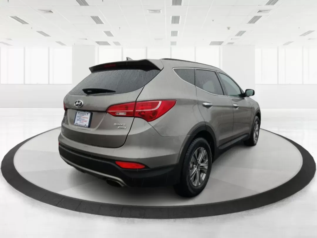 2016 Hyundai Santa Fe Sport 2.4 AWD (5XYZUDLB9GG) with an 2.4L L4 DOHC 16V engine, 6-Speed Automatic transmission, located at 880 E. National Road, Vandalia, OH, 45377, (937) 908-9800, 39.891918, -84.183594 - 2016 Hyundai Santa Fe Sport 2.4 AWD - Photo#2