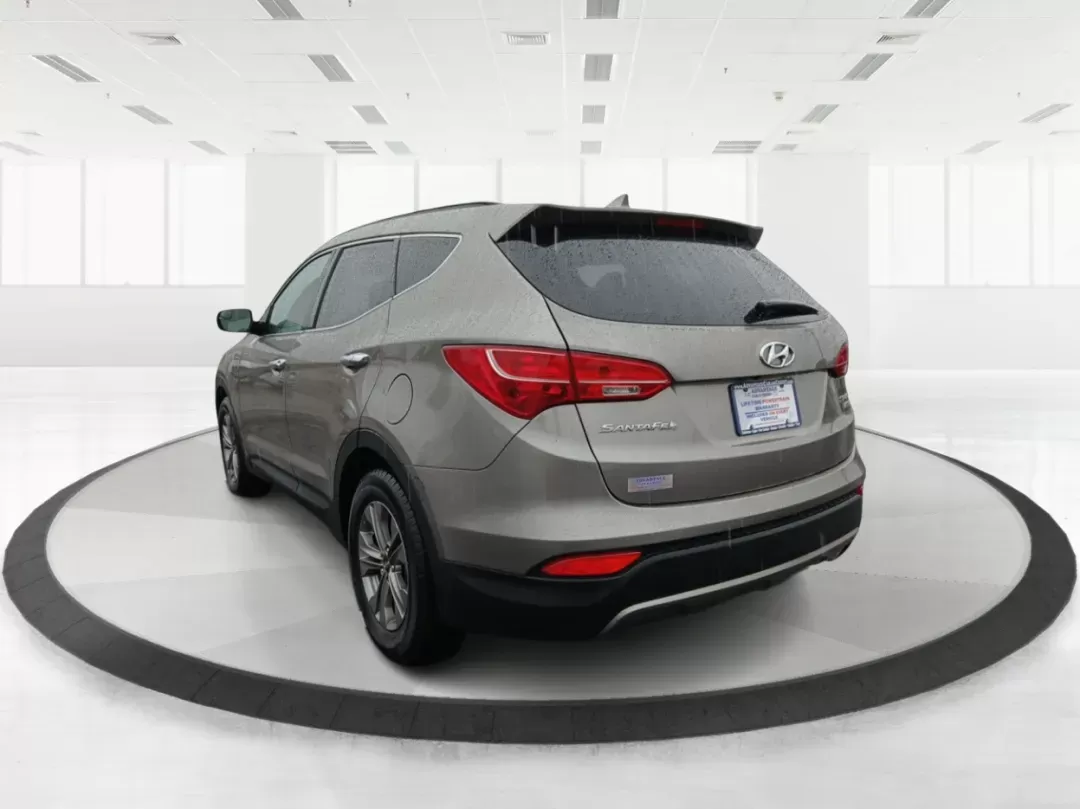 2016 Hyundai Santa Fe Sport 2.4 AWD (5XYZUDLB9GG) with an 2.4L L4 DOHC 16V engine, 6-Speed Automatic transmission, located at 880 E. National Road, Vandalia, OH, 45377, (937) 908-9800, 39.891918, -84.183594 - 2016 Hyundai Santa Fe Sport 2.4 AWD - Photo#4