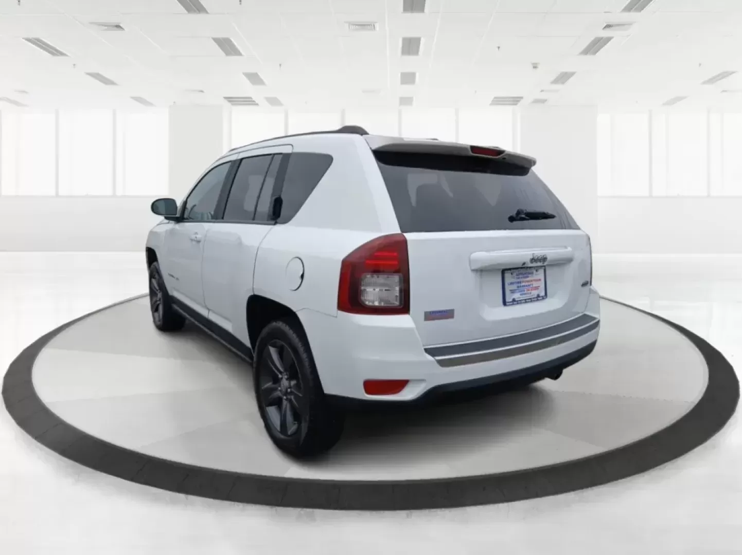 2016 Jeep Compass Latitude FWD (1C4NJCEA3GD) with an 2.0L L4 DOHC 16V engine, Continuously Variable Transmission transmission, located at 880 E. National Road, Vandalia, OH, 45377, (937) 908-9800, 39.891918, -84.183594 - 2016 Jeep Compass Latitude FWD - Photo#5