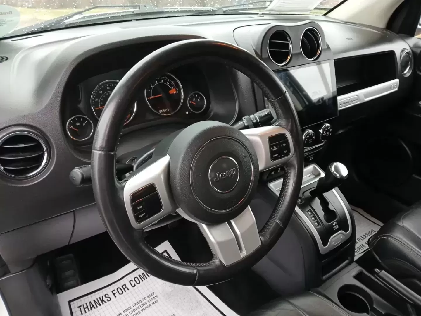 2016 Jeep Compass Latitude FWD (1C4NJCEA3GD) with an 2.0L L4 DOHC 16V engine, Continuously Variable Transmission transmission, located at 880 E. National Road, Vandalia, OH, 45377, (937) 908-9800, 39.891918, -84.183594 - 2016 Jeep Compass Latitude FWD - Photo#9