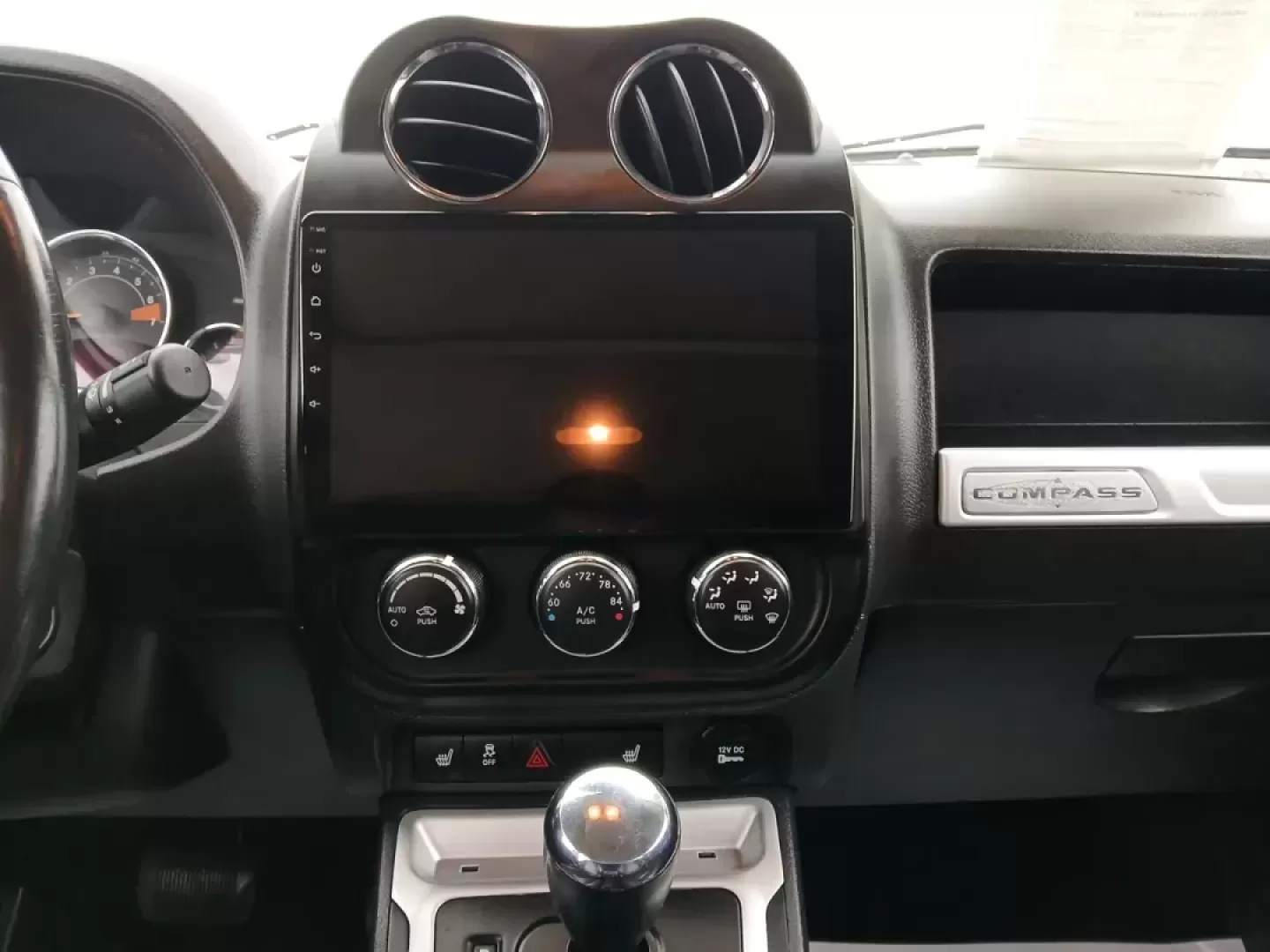 2016 Jeep Compass Latitude FWD (1C4NJCEA3GD) with an 2.0L L4 DOHC 16V engine, Continuously Variable Transmission transmission, located at 880 E. National Road, Vandalia, OH, 45377, (937) 908-9800, 39.891918, -84.183594 - 2016 Jeep Compass Latitude FWD - Photo#13
