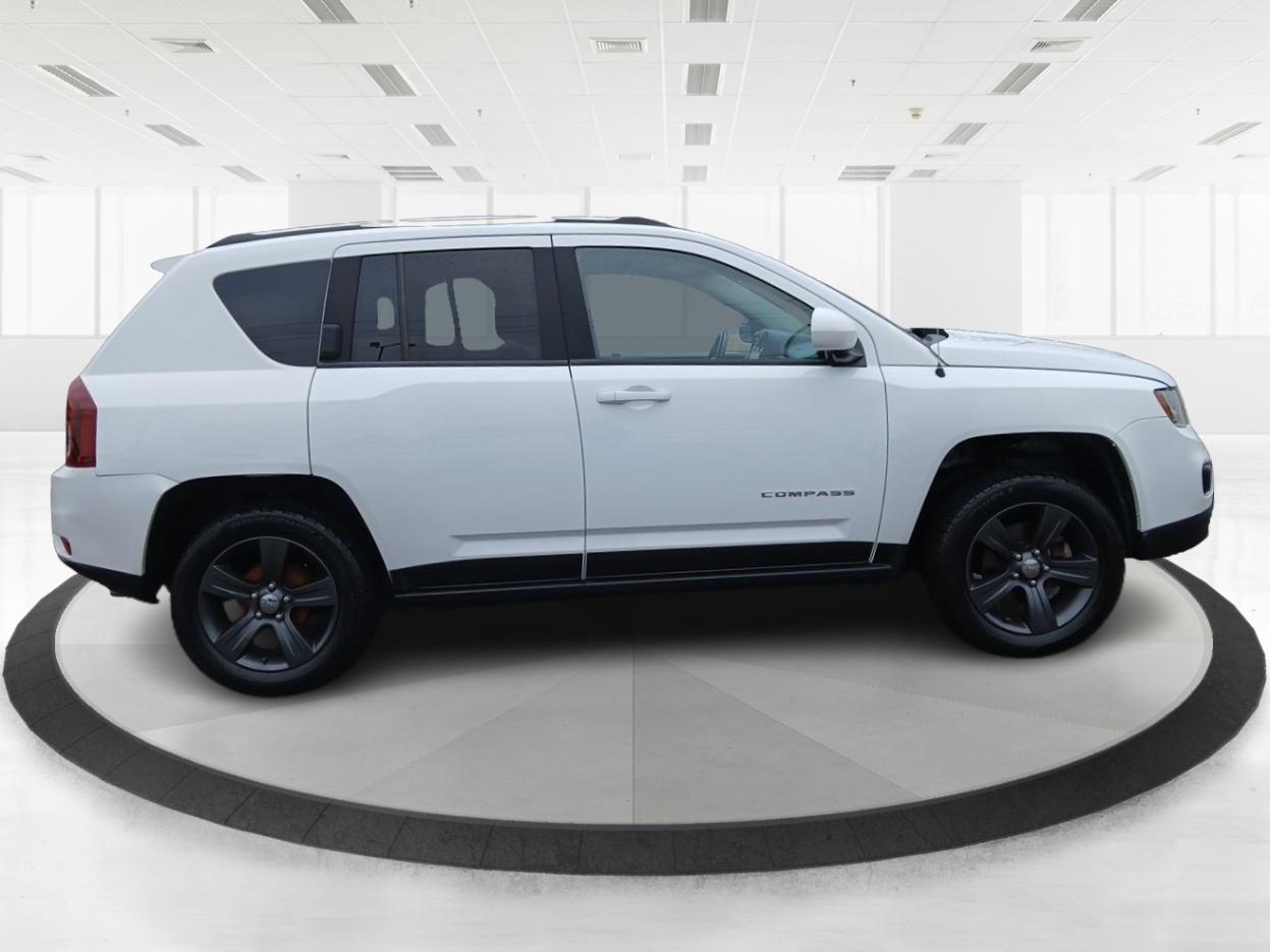 2016 Jeep Compass Latitude FWD (1C4NJCEA3GD) with an 2.0L L4 DOHC 16V engine, Continuously Variable Transmission transmission, located at 1099 N County Rd 25A , Troy, OH, 45373, (937) 908-9800, 40.057079, -84.212883 - 2016 Jeep Compass Latitude FWD - Photo#1