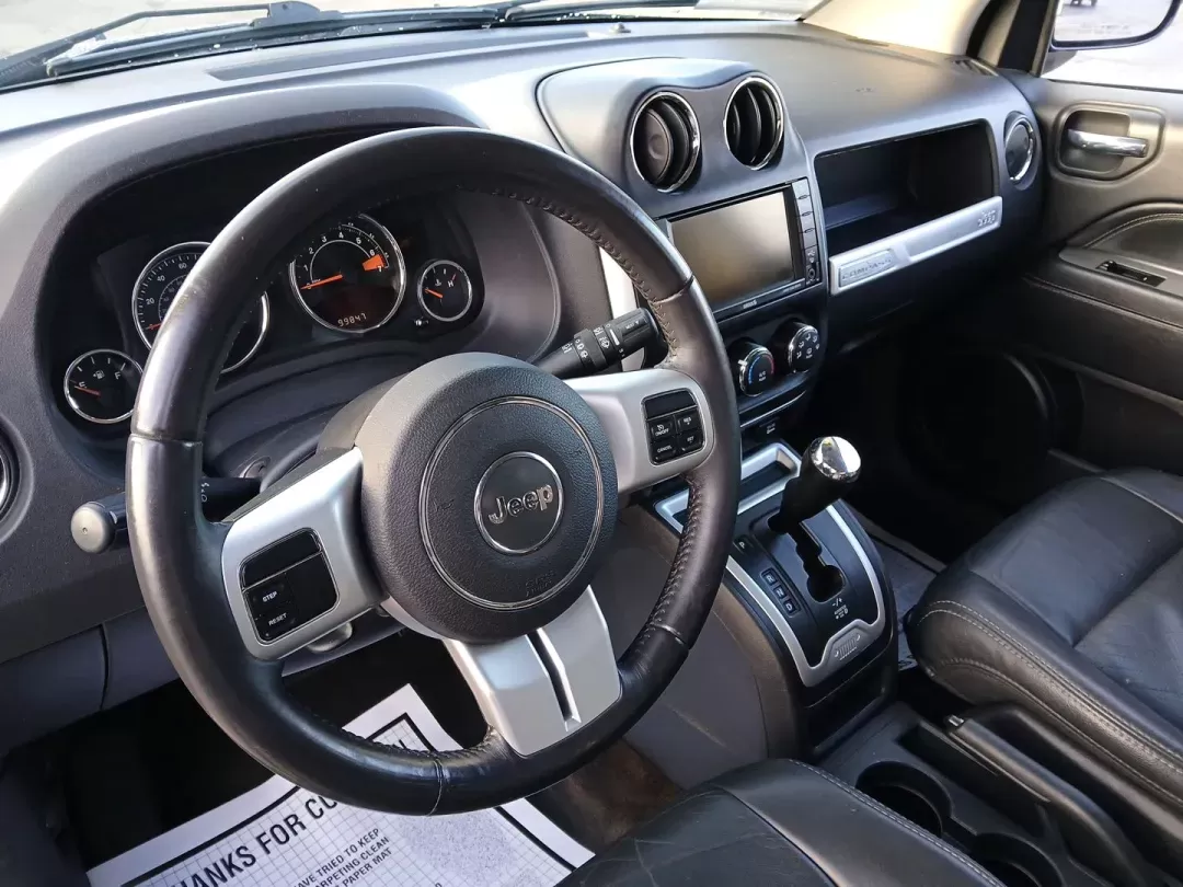 2016 Jeep Compass Latitude 4WD (1C4NJDEB7GD) with an 2.4L L4 DOHC 16V engine, 6-Speed Automatic transmission, located at 401 Woodman Dr, Riverside, OH, 45431, (937) 908-9800, 39.760899, -84.123421 - 2016 Jeep Compass Latitude 4WD - Photo#8