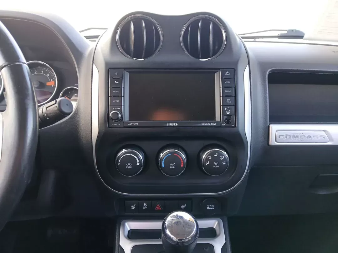 2016 Jeep Compass Latitude 4WD (1C4NJDEB7GD) with an 2.4L L4 DOHC 16V engine, 6-Speed Automatic transmission, located at 401 Woodman Dr, Riverside, OH, 45431, (937) 908-9800, 39.760899, -84.123421 - 2016 Jeep Compass Latitude 4WD - Photo#12