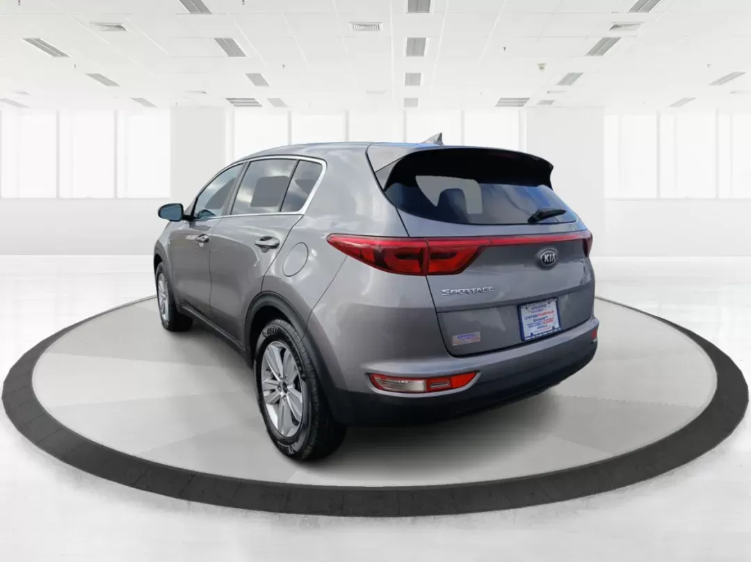 2017 Kia Sportage LX AWD (KNDPMCAC3H7) with an 2.4L V6 DOHC 24V engine, 6-Speed Automatic transmission, located at 1951 S Dayton Lakeview Rd., New Carlisle, OH, 45344, (937) 908-9800, 39.890999, -84.050255 - 2017 Kia Sportage LX AWD - Photo#4