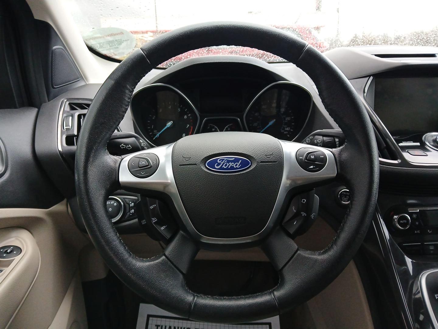 2014 Ford Escape Titanium 4WD (1FMCU9J92EU) with an 2.0L L4 DOHC 16V engine, 6-Speed Automatic transmission, located at 401 Woodman Dr, Riverside, OH, 45431, (937) 908-9800, 39.760899, -84.123421 - One Owner - Photo#15