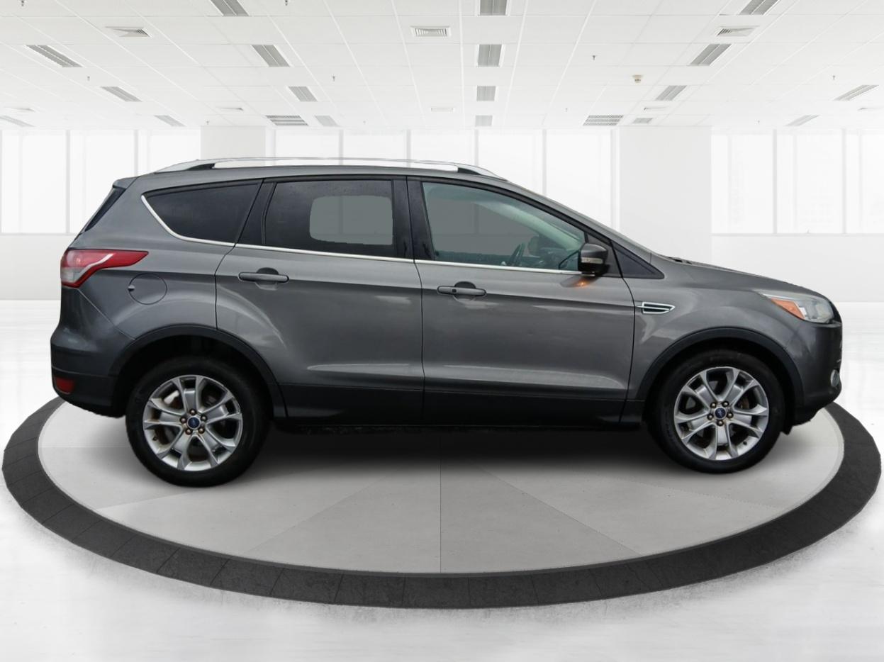 2014 Ford Escape Titanium 4WD (1FMCU9J92EU) with an 2.0L L4 DOHC 16V engine, 6-Speed Automatic transmission, located at 401 Woodman Dr, Riverside, OH, 45431, (937) 908-9800, 39.760899, -84.123421 - One Owner - Photo#1