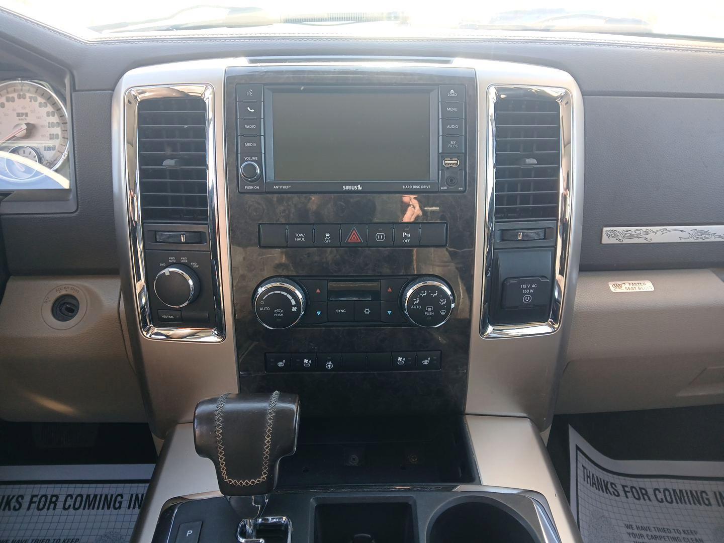 2012 Ram 1500 Laramie Longhorn Edition Crew Cab 4WD (1C6RD7PT8CS) with an 5.7L V8 OHV 16V engine, 6-Speed Automatic transmission, located at 8750 N County Rd 25A, Piqua, OH, 45356, (937) 908-9800, 40.164391, -84.232513 - 2012 Ram 1500 Laramie Longhorn Edition Crew Cab 4WD - Photo#12