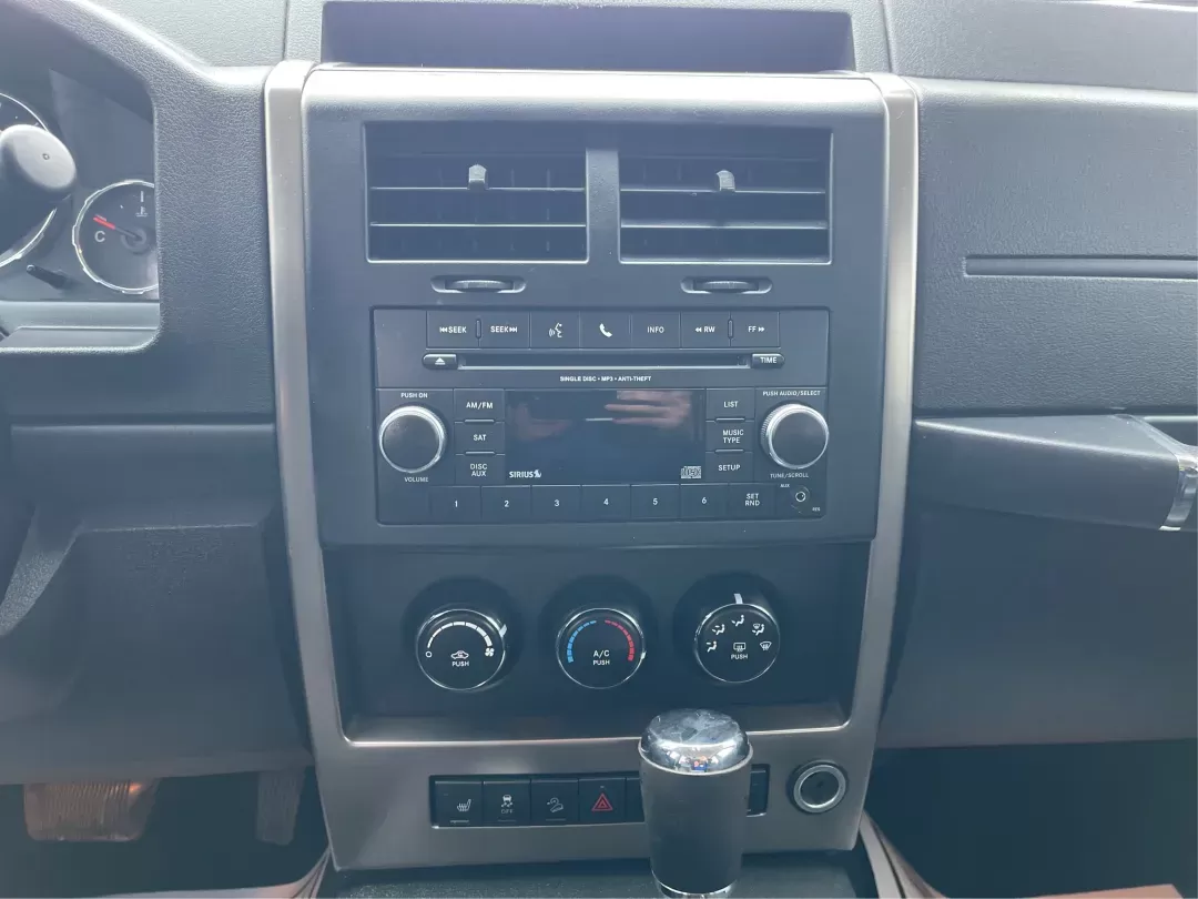 2012 Jeep Liberty Sport 4WD (1C4PJMAK8CW) with an 3.7L V6 SOHC 12V engine, 4-Speed Automatic transmission, located at 1099 N County Rd 25A , Troy, OH, 45373, (937) 908-9800, 40.057079, -84.212883 - 2012 Jeep Liberty Sport 4WD - Photo#13