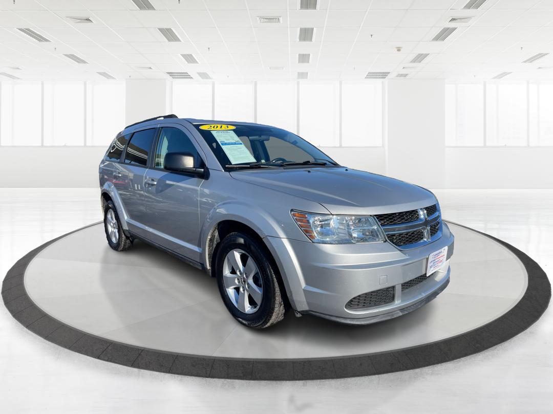 2013 Dodge Journey SE (3C4PDCAB8DT) with an 2.4L L4 DOHC 16V engine, 4-Speed Automatic transmission, located at 1184 Kauffman Ave, Fairborn, OH, 45324, (937) 908-9800, 39.807072, -84.030914 - 2013 Dodge Journey SE - Photo#0