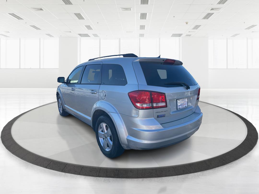 2013 Dodge Journey SE (3C4PDCAB8DT) with an 2.4L L4 DOHC 16V engine, 4-Speed Automatic transmission, located at 1184 Kauffman Ave, Fairborn, OH, 45324, (937) 908-9800, 39.807072, -84.030914 - 2013 Dodge Journey SE - Photo#4