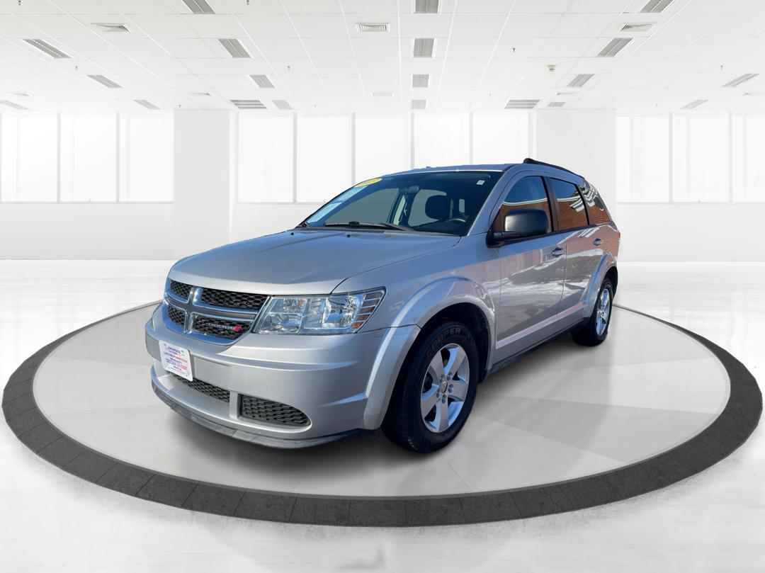 2013 Dodge Journey SE (3C4PDCAB8DT) with an 2.4L L4 DOHC 16V engine, 4-Speed Automatic transmission, located at 1184 Kauffman Ave, Fairborn, OH, 45324, (937) 908-9800, 39.807072, -84.030914 - 2013 Dodge Journey SE - Photo#7