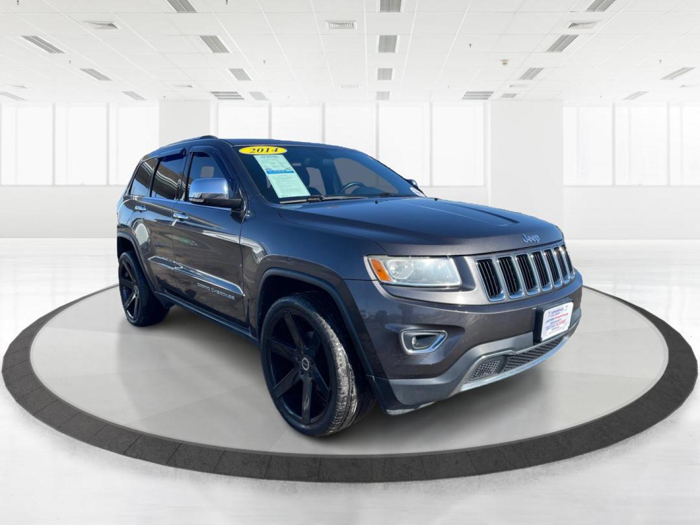 2014 Jeep Grand Cherokee Limited 4WD (1C4RJFBG4EC) with an 3.6L V6 DOHC 24V engine, 5-Speed Automatic transmission, located at 1951 S Dayton Lakeview Rd., New Carlisle, OH, 45344, (937) 908-9800, 39.890999, -84.050255 - Photo#0