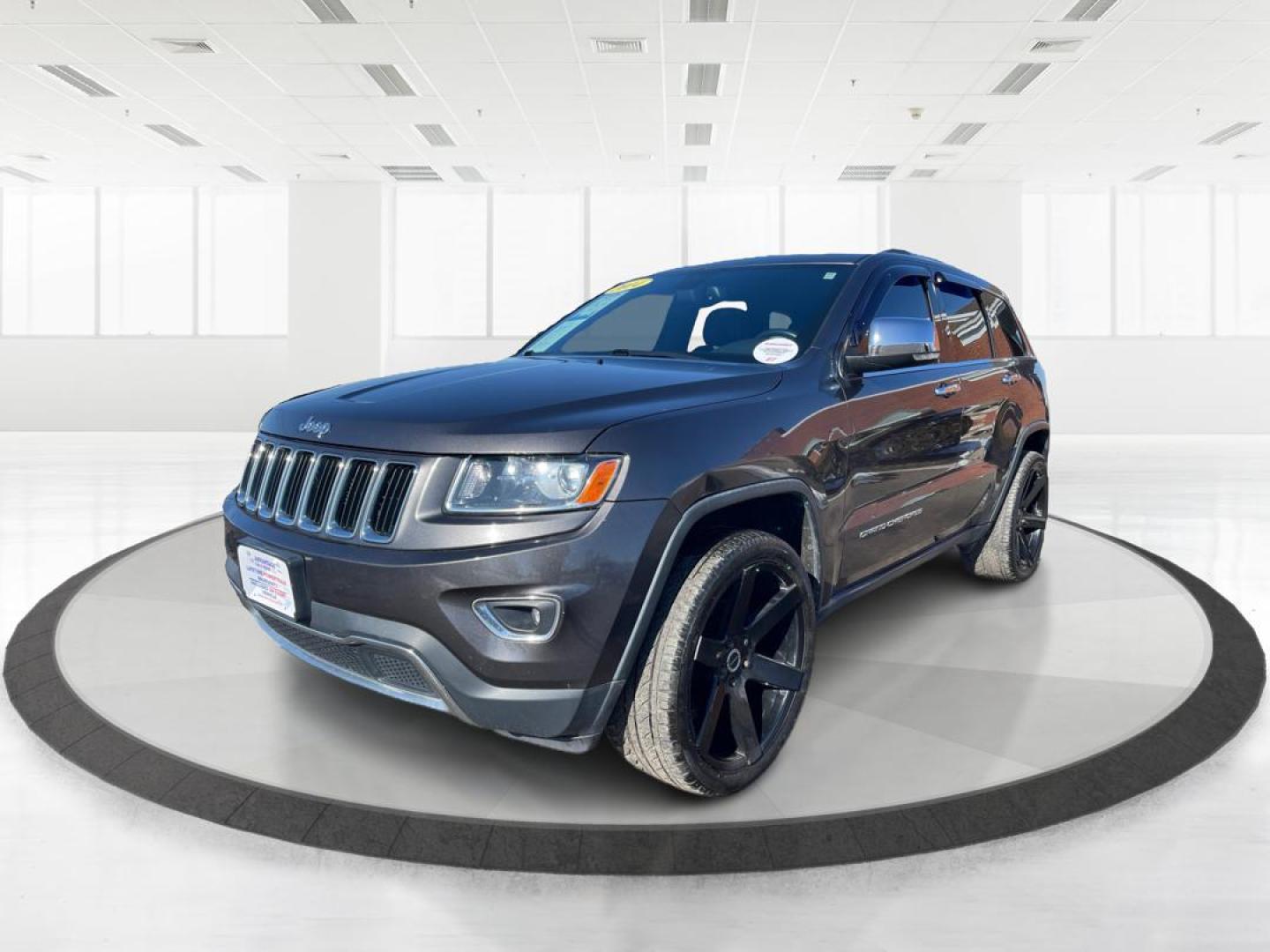 2014 Jeep Grand Cherokee Limited 4WD (1C4RJFBG4EC) with an 3.6L V6 DOHC 24V engine, 5-Speed Automatic transmission, located at 1951 S Dayton Lakeview Rd., New Carlisle, OH, 45344, (937) 908-9800, 39.890999, -84.050255 - Photo#7