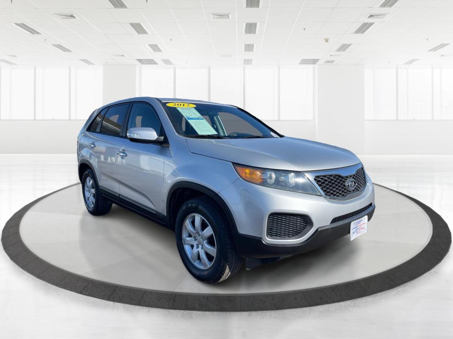 2012 Kia Sorento LX 2WD (5XYKT3A1XCG) with an 2.4L L4 DOHC 16V engine, 6-Speed Automatic transmission, located at 1099 N County Rd 25A, Troy, OH, 45373, (937) 908-9800, 40.057079, -84.212883 - One Owner - Photo#0