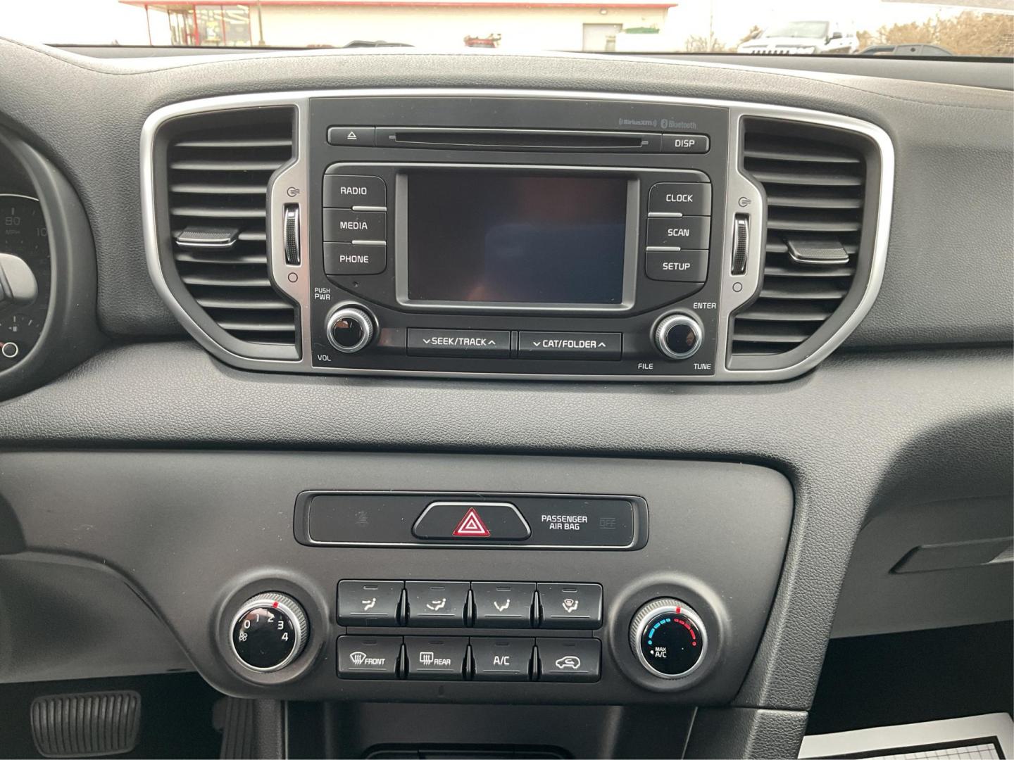 2019 Kia Sportage LX (KNDPMCAC8K7) with an Theta II 2.4L I-4 gasoline direct injection engine, located at 8750 N County Rd 25A, Piqua, OH, 45356, (937) 908-9800, 40.164391, -84.232513 - Photo#11