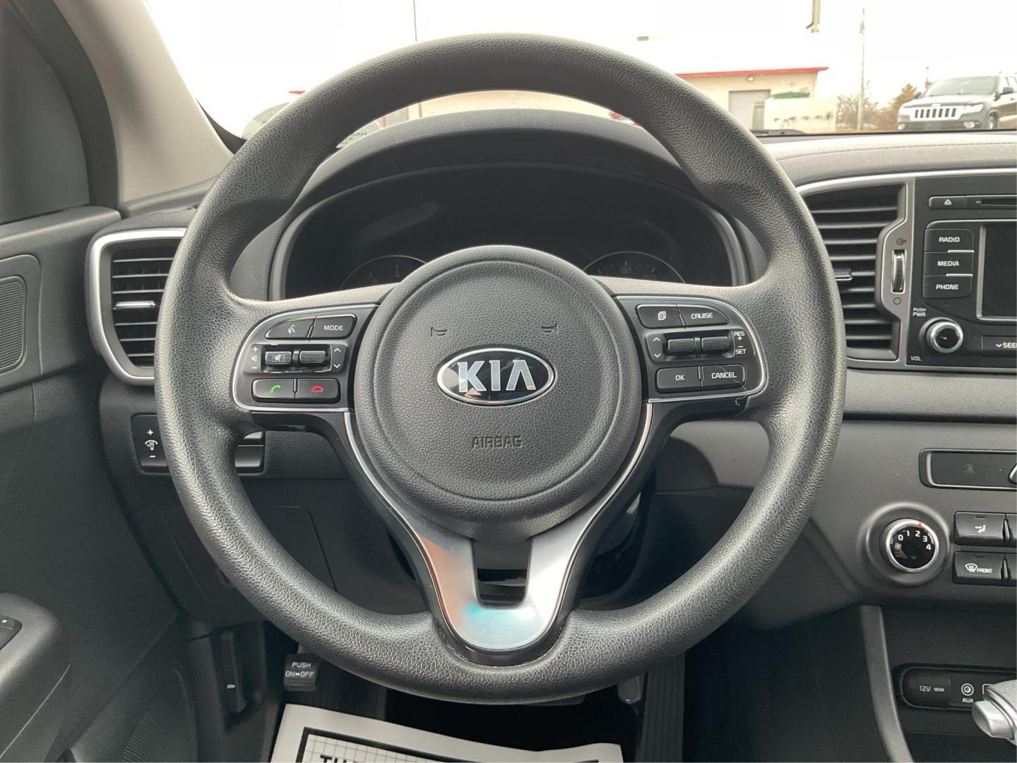 2019 Kia Sportage LX (KNDPMCAC8K7) with an Theta II 2.4L I-4 gasoline direct injection engine, located at 8750 N County Rd 25A, Piqua, OH, 45356, (937) 908-9800, 40.164391, -84.232513 - Photo#14