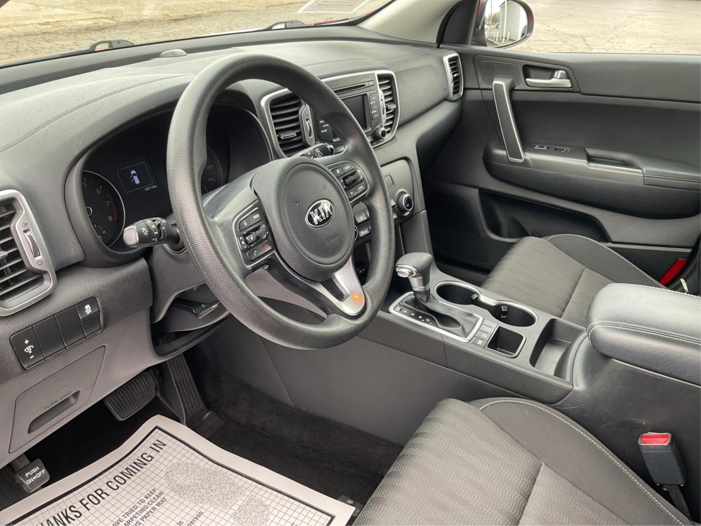 2019 Kia Sportage LX (KNDPMCAC8K7) with an Theta II 2.4L I-4 gasoline direct injection engine, located at 8750 N County Rd 25A, Piqua, OH, 45356, (937) 908-9800, 40.164391, -84.232513 - Photo#7