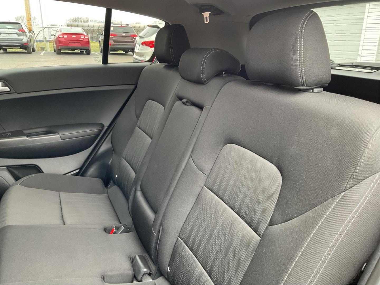 2019 Kia Sportage LX (KNDPMCAC8K7) with an Theta II 2.4L I-4 gasoline direct injection engine, located at 8750 N County Rd 25A, Piqua, OH, 45356, (937) 908-9800, 40.164391, -84.232513 - Photo#8